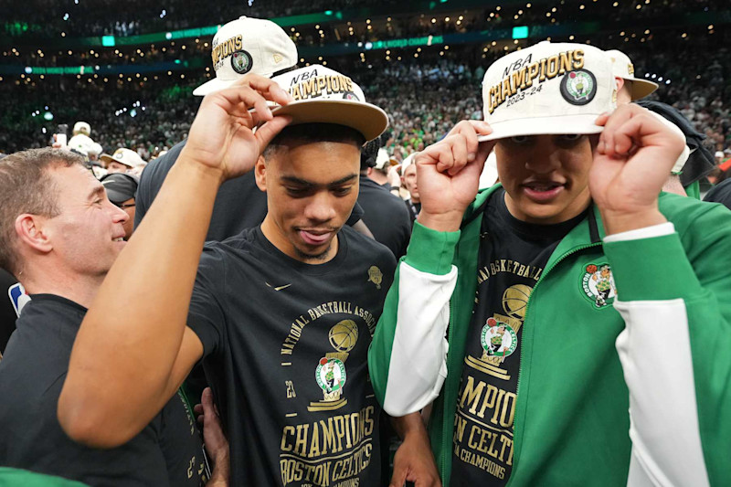 BOSTON, MA - JUNE 17: Jaden Springer #44 and Jordan Walsh #27 of the Boston Celtics celebrate after the game against the Dallas Mavericks during Game 5 of the 2024 NBA Finals on June 17, 2024 at the TD Garden in Boston, Massachusetts. NOTE TO USER: User expressly acknowledges and agrees that, by downloading and or using this photograph, User is consenting to the terms and conditions of the Getty Images License Agreement. Mandatory Copyright Notice: Copyright 2024 NBAE  (Photo by Jesse D. Garrabrant/NBAE via Getty Images)