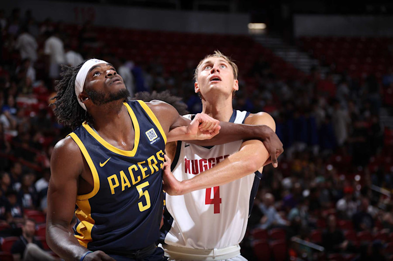 LAS VEGAS, NV - JULY 18: Jarace Walker #5 of the Indiana Pacers boxes out against Hunter Tyson #4 of the Denver Nuggets during the game on July 18, 2024 at the Thomas & Mack Center in Las Vegas, Nevada. NOTE TO USER: User expressly acknowledges and agrees that, by downloading and or using this photograph, User is consenting to the terms and conditions of the Getty Images License Agreement. Mandatory Copyright Notice: Copyright 2024 NBAE (Photo by Stephen Gosling/NBAE via Getty Images)