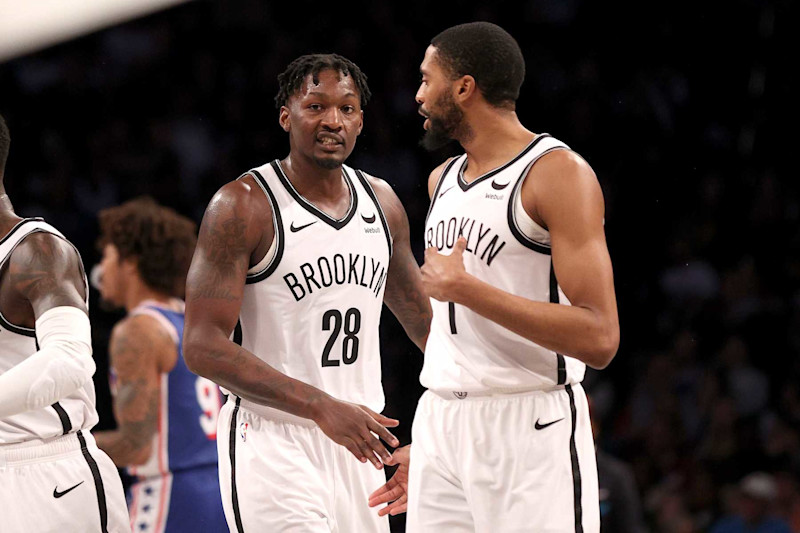 NEW YORK, NEW YORK - MARCH 05: Dorian Finney-Smith #28 and Mikal Bridges #1 of the Brooklyn Nets react in the third quarter against the Philadelphia 76ers at Barclays Center on March 05, 2024 in New York City. NOTE TO USER: User expressly acknowledges and agrees that, by downloading and or using this photograph, User is consenting to the terms and conditions of the Getty Images License Agreement. (Photo by Mike Lawrie/Getty Images)