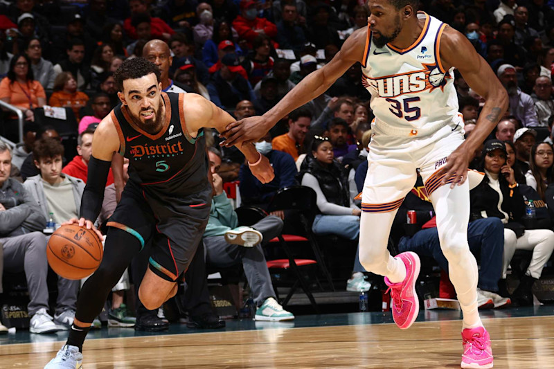 WASHINGTON, DC -  FEBRUARY 4: Tyus Jones #5 of the Washington Wizards drives to the basket during the game against the Phoenix Suns on February 4, 2024 at Capital One Arena in Washington, DC. NOTE TO USER: User expressly acknowledges and agrees that, by downloading and or using this Photograph, user is consenting to the terms and conditions of the Getty Images License Agreement. Mandatory Copyright Notice: Copyright 2024 NBAE (Photo by Kenny Giarla/NBAE via Getty Images)