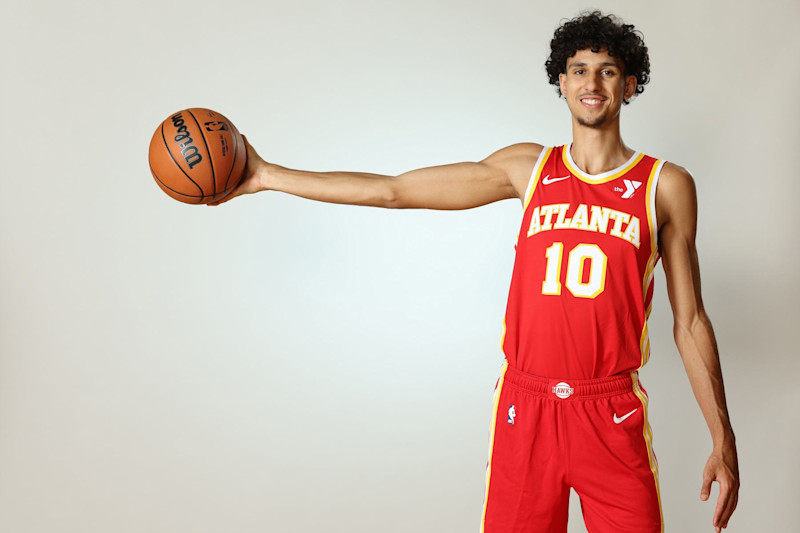 LAS VEGAS, NEVADA - JULY 16: Zaccharie Risacher #10 of the Atlanta Hawks poses for a portrait during the 2024 NBA Rookie Photo Shoot at UNLV on July 16, 2024 in Las Vegas, Nevada.  (Photo by Monica Schipper/Getty Images)