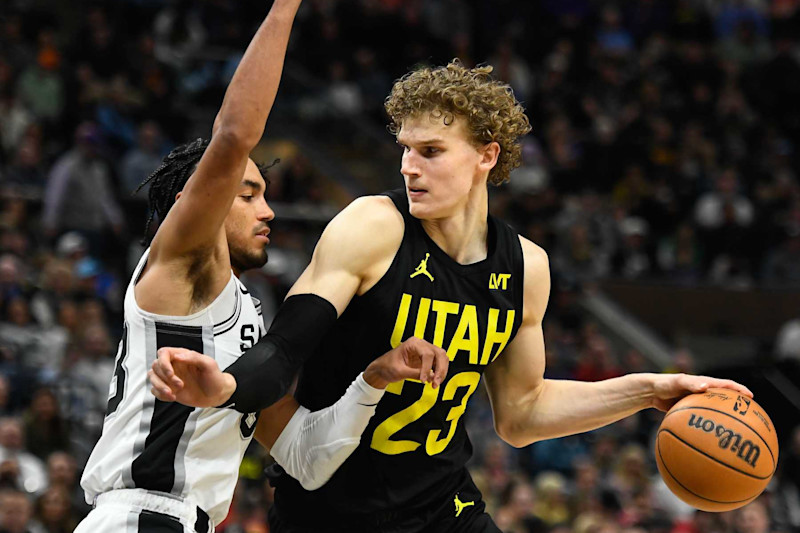 SALT LAKE CITY, UTAH - MARCH 27: Lauri Markkanen #23 of the Utah Jazz in action with Tre Jones #33 of the San Antonio Spurs during the second half of a game at Delta Center on March 27, 2024 in Salt Lake City, Utah. NOTE TO USER: User expressly acknowledges and agrees that, by downloading and or using this photograph, User is consenting to the terms and conditions of the Getty Images License Agreement. (Photo by Alex Goodlett/Getty Images)