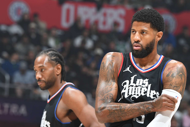 LOS ANGELES, CA - APRIL 23: Paul George #13 of the LA Clippers looks on during the game against the Dallas Mavericks during Round 1 Game 2 of the 2024 NBA Playoffs on April 23, 2024 at Crypto.Com Arena in Los Angeles, California. NOTE TO USER: User expressly acknowledges and agrees that, by downloading and/or using this Photograph, user is consenting to the terms and conditions of the Getty Images License Agreement. Mandatory Copyright Notice: Copyright 2024 NBAE (Photo by Andrew D. Bernstein/NBAE via Getty Images)