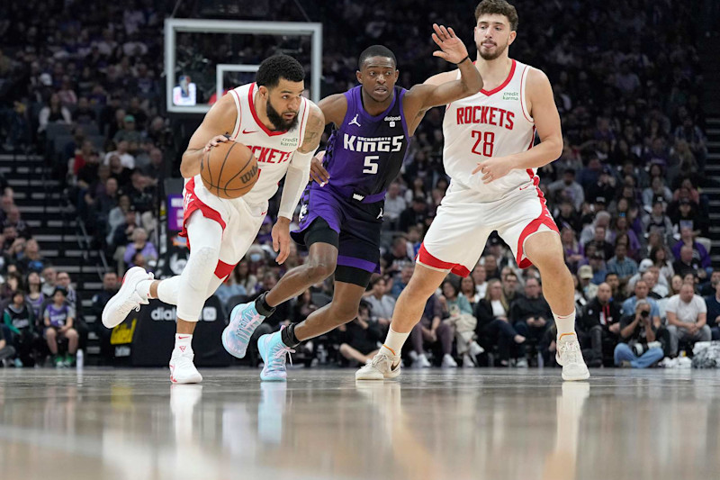 SACRAMENTO, CALIFORNIA - MARCH 10: Fred VanVleet #5 of the Houston Rockets dribbles around a screen set by Alperen Sengun #28 on De'Aaron Fox #5 of the Sacramento Kings during the first half of an NBA basketball game at Golden 1 Center on March 10, 2024 in Sacramento, California. NOTE TO USER: User expressly acknowledges and agrees that, by downloading and or using this photograph, User is consenting to the terms and conditions of the Getty Images License Agreement. (Photo by Thearon W. Henderson/Getty Images)