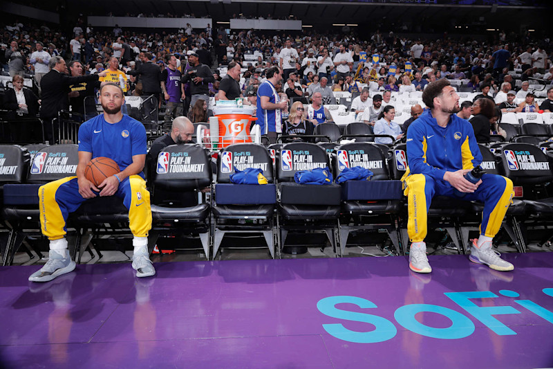 SACRAMENTO, CA - APRIL 16: Stephen Curry #30 and Klay Thompson #11 of the Golden State Warriors look on from the bench prior to the game against the Sacramento Kings during the 2024 Play-In Tournament on April 16, 2024 at Golden 1 Center in Sacramento, California. NOTE TO USER: User expressly acknowledges and agrees that, by downloading and or using this photograph, User is consenting to the terms and conditions of the Getty Images Agreement. Mandatory Copyright Notice: Copyright 2024 NBAE (Photo by Rocky Widner/NBAE via Getty Images)