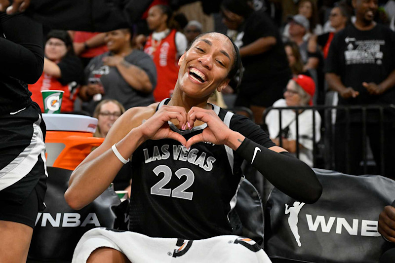 LAS VEGAS, NV - SEPTEMBER 15: A'ja Wilson #22 of the Las Vegas Aces celebrates after becoming the first WNBA player to score 1,000 points in a single season during the game against the Connecticut Sun on September 15, 2024 at Michelob ULTRA Arena in Las Vegas, Nevada. NOTE TO USER: User expressly acknowledges and agrees that, by downloading and or using this photograph, User is consenting to the terms and conditions of the Getty Images License Agreement. Mandatory Copyright Notice: Copyright 2024 NBAE (Photo by David Becker/NBAE via Getty Images)