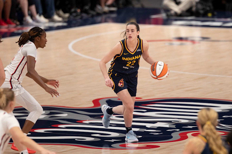 WASHINGTON, DC - SEPTEMBER 19: Indiana Fever guard Caitlin Clark (22) looks for teammates cutting to the basket during the WNBA game between the Indiana Fever and the Washington Mystics on September  19h, 2024 at Entertainment and Sports Arena in Washington, DC. (Photo by Charles Brock/Icon Sportswire via Getty Images)