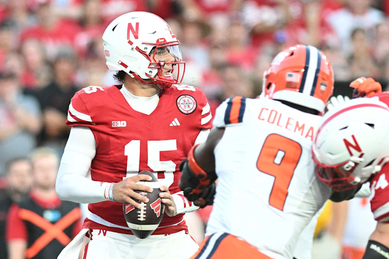 LINCOLN, NEBRASKA - SEPTEMBER 20: Dylan Raiola #15 of the Nebraska Cornhuskers drops back to pass against the Illinois Fighting Illini during the first quarter at Memorial Stadium on September 20, 2024 in Lincoln, Nebraska.  (Photo by Steven Branscombe/Getty Images)