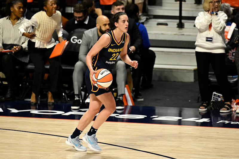 UNCASVILLE, CT - SEPTEMBER 22: Caitlin Clark #22 of the Indiana Fever dribbles the ball during the game against the Connecticut Sun during round one game one of the 2024 WNBA Playoffs on September 22, 2024 at the Mohegan Sun Arena in Uncasville, Connecticut. NOTE TO USER: User expressly acknowledges and agrees that, by downloading and or using this photograph, User is consenting to the terms and conditions of the Getty Images License Agreement. Mandatory Copyright Notice: Copyright 2024 NBAE (Photo by David Dow/NBAE via Getty Images)