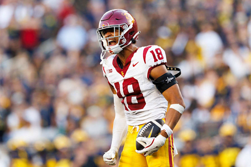 ANN ARBOR, MICHIGAN - SEPTEMBER 21: Eric Gentry #18 of the USC Trojans celebrates during the second half against Michigan Wolverines at Michigan Stadium on September 21, 2024 in Ann Arbor, Michigan. (Photo by Ric Tapia/Getty Images)