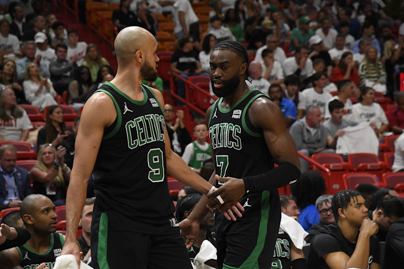 MIAMI, FL - APRIL 27: Jaylen Brown #7 high fivesDerrick White #9 of the Boston Celtics during the game against the Miami Heat during Round 1 Game 3 of the 2024 NBA Playoffs on April 27, 2024 at Kaseya Center in Miami, Florida. NOTE TO USER: User expressly acknowledges and agrees that, by downloading and or using this Photograph, user is consenting to the terms and conditions of the Getty Images License Agreement. Mandatory Copyright Notice: Copyright 2024 NBAE (Photo by Brian Babineau/NBAE via Getty Images)