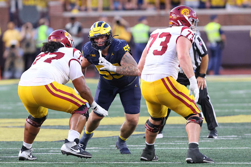 ANN ARBOR, MI - SEPTEMBER 21: Michigan Wolverines defensive lineman Mason Graham (55) rushes during a play during the fourth quarter of a Big Ten Conference college football game between the USC Trojans and the Michigan Wolverines on September 21, 2024 at Michigan Stadium in Ann Arbor, Michigan.  (Photo by Scott W. Grau/Icon Sportswire via Getty Images)