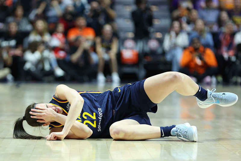 UNCASVILLE, CT - SEPTEMBER 22: Indiana Fever guard Caitlin Clark (22) reacts after getting hit in the eye during the First Round and game 1 of the 2024 WNBA playoffs between Indiana Fever and Connecticut Sun on September 22, 2024, at Mohegan Sun Arena in Uncasville, CT. (Photo by M. Anthony Nesmith/Icon Sportswire via Getty Images)