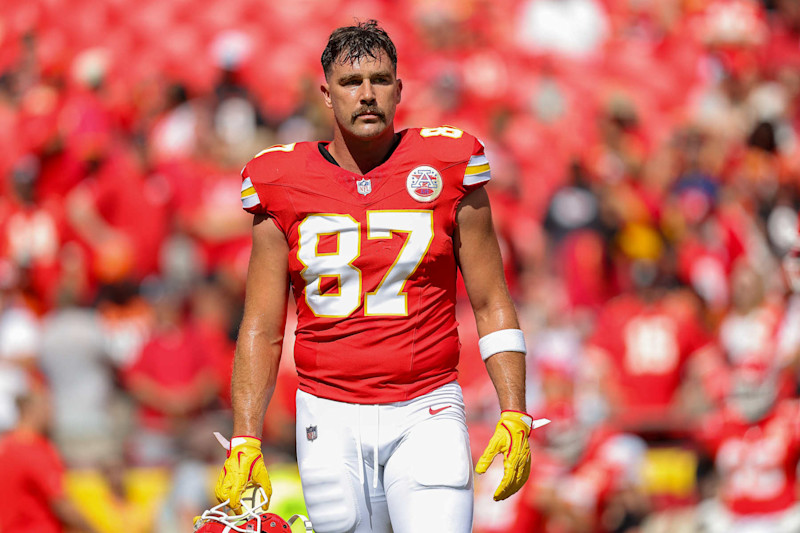 KANSAS CITY, MISSOURI - SEPTEMBER 15: Travis Kelce #87 of the Kansas City Chiefs walks the field during pregame warmups prior to the regular season game against the Cincinnati Bengals at GEHA Field at Arrowhead Stadium on September 15, 2024 in Kansas City, Missouri. (Photo by David Eulitt/Getty Images)