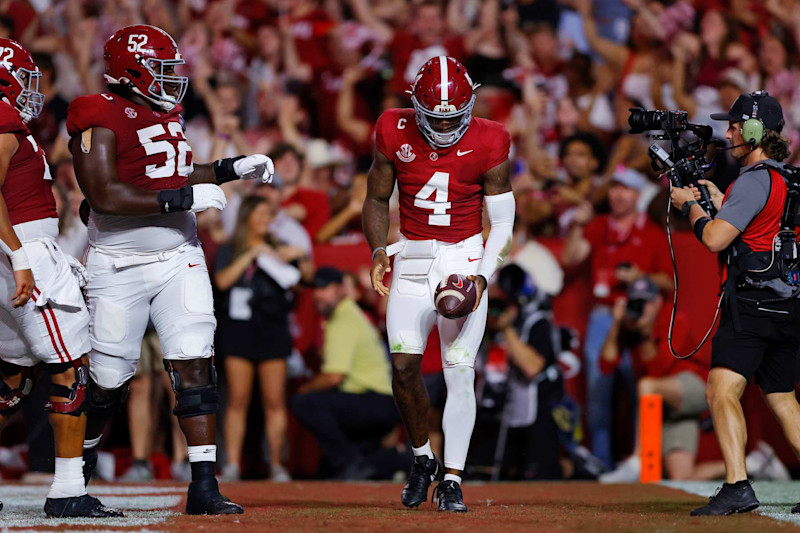 TUSCALOOSA, ALABAMA - SEPTEMBER 28: Jalen Milroe #4 of the Alabama Crimson Tide celebrates after scoring a rushing touchdown against the Georgia Bulldogs during the first quarter at Bryant-Denny Stadium on September 28, 2024 in Tuscaloosa, Alabama. (Photo by Todd Kirkland/Getty Images)