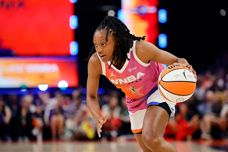 PHOENIX, ARIZONA - JULY 20: Kelsey Mitchell #0 of Team WNBA drives against the USA Basketball Women's National Team during the first half of the 2024 WNBA All-Star game at Footprint Center on July 20, 2024 in Phoenix, Arizona. NOTE TO USER: User expressly acknowledges and agrees that, by downloading and or using this photograph, User is consenting to the terms and conditions of the Getty Images License Agreement. (Photo by Alex Slitz/Getty Images)