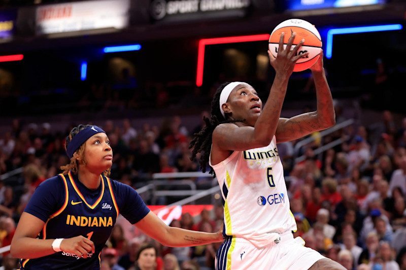 INDIANAPOLIS, INDIANA - SEPTEMBER 15: Natasha Howard #6 of the Dallas Wings takes a shot against NaLyssa Smith #1 of the Indiana Fever during the first half at Gainbridge Fieldhouse on September 15, 2024 in Indianapolis, Indiana. NOTE TO USER: User expressly acknowledges and agrees that, by downloading and or using this photograph, User is consenting to the terms and conditions of the Getty Images License Agreement. (Photo by Justin Casterline/Getty Images)