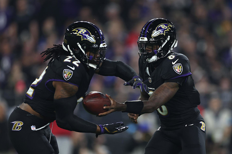 BALTIMORE, MARYLAND - SEPTEMBER 29: Lamar Jackson #8 of the Baltimore Ravens hands the ball off to Derrick Henry #22 of the Baltimore Ravens during the first quarter against the Buffalo Bills at M&T Bank Stadium on September 29, 2024 in Baltimore, Maryland. (Photo by Patrick Smith/Getty Images)