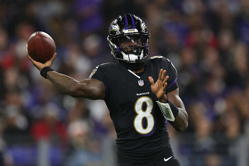 BALTIMORE, MARYLAND - SEPTEMBER 29: Lamar Jackson #8 of the Baltimore Ravens throws a pass during the third quarter against the Buffalo Bills at M&T Bank Stadium on September 29, 2024 in Baltimore, Maryland. (Photo by Patrick Smith/Getty Images)