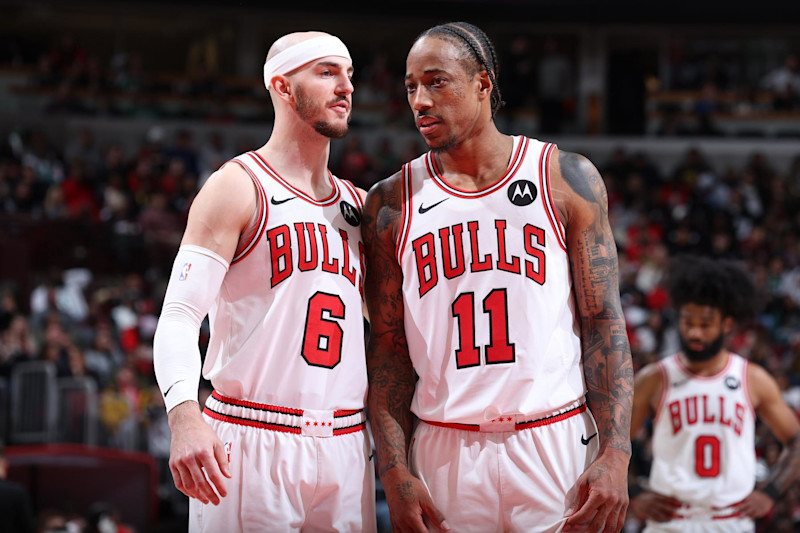 CHICAGO, IL - MARCH 23:  Alex Caruso #6 and DeMar DeRozan #11 of the Chicago Bulls looks on during the game against the Boston Celtics on March 23, 2024 at United Center in Chicago, Illinois. NOTE TO USER: User expressly acknowledges and agrees that, by downloading and or using this photograph, User is consenting to the terms and conditions of the Getty Images License Agreement. Mandatory Copyright Notice: Copyright 2024 NBAE (Photo by Jeff Haynes/NBAE via Getty Images)