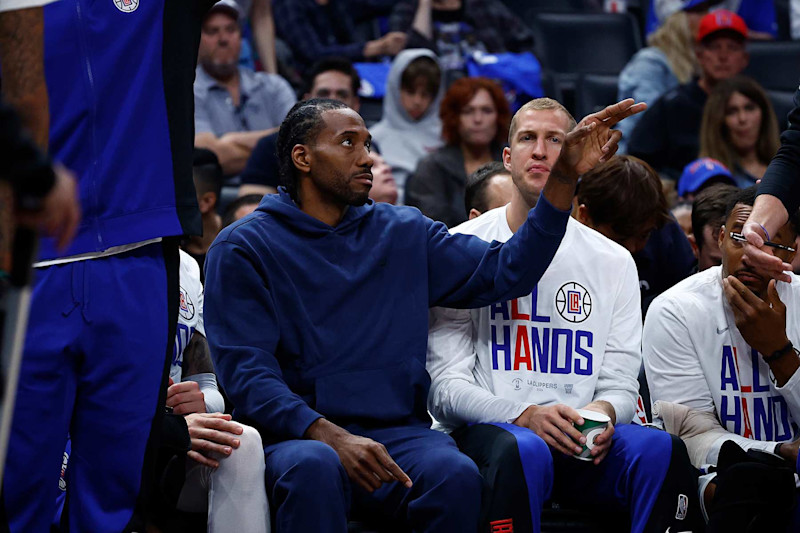 LOS ANGELES, CALIFORNIA - APRIL 21: Kawhi Leonard #2 of the LA Clippers on the bench against the Dallas Mavericks in the second half during game one of the Western Conference First Round Playoffs at Crypto.com Arena on April 21, 2024 in Los Angeles, California. NOTE TO USER: User expressly acknowledges and agrees that, by downloading and/or using this photograph, user is consenting to the terms and conditions of the Getty Images License Agreement. (Photo by Ronald Martinez/Getty Images)