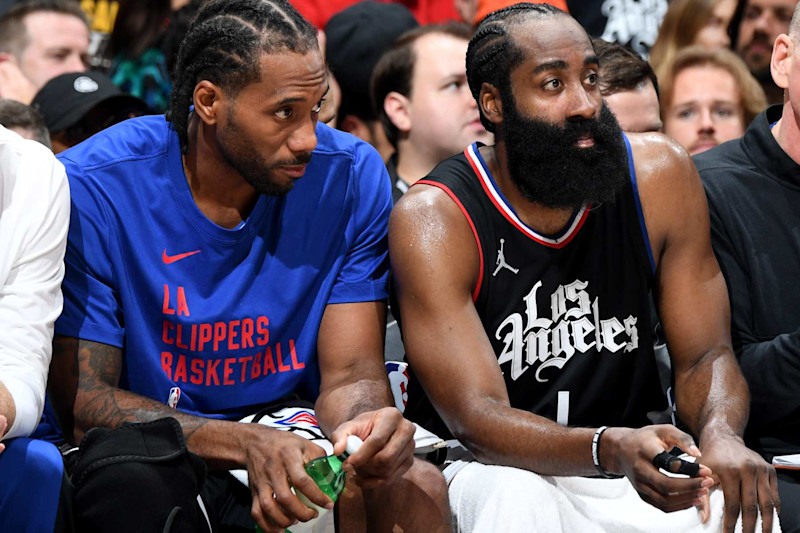 LOS ANGELES, CA - APRIL 23: James Harden #1 and Kawhi Leonard #2 of the LA Clippers look on during the game against the Dallas Mavericks during Round 1 Game 2 of the 2024 NBA Playoffs on April 23, 2024 at Crypto.Com Arena in Los Angeles, California. NOTE TO USER: User expressly acknowledges and agrees that, by downloading and/or using this Photograph, user is consenting to the terms and conditions of the Getty Images License Agreement. Mandatory Copyright Notice: Copyright 2024 NBAE (Photo by Andrew D. Bernstein/NBAE via Getty Images)