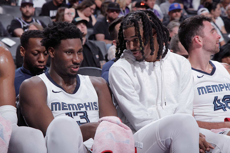 SACRAMENTO, CA - MARCH 18: Jaren Jackson Jr. #13 and Ja Morant #12 of the Memphis Grizzlies talk on the bench during the game against the Sacramento Kings on March 18, 2024 at Golden 1 Center in Sacramento, California. NOTE TO USER: User expressly acknowledges and agrees that, by downloading and or using this photograph, User is consenting to the terms and conditions of the Getty Images Agreement. Mandatory Copyright Notice: Copyright 2024 NBAE (Photo by Rocky Widner/NBAE via Getty Images)