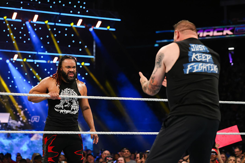 SACRAMENTO, CALIFORNIA - SEPTEMBER 20: Jacob Fatu and Kevin Owens face off during WWE SmackDown at Golden 1 Center on September 20, 2024 in Sacramento, California.  (Photo by WWE/Getty Images)