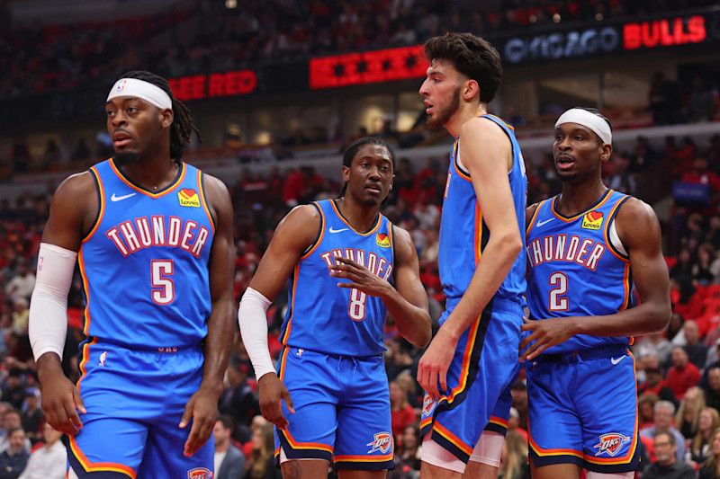 CHICAGO, ILLINOIS - OCTOBER 25: Luguentz Dort #5, Jalen Williams #8, Chet Holmgren #7 and Shai Gilgeous-Alexander #2 of the Oklahoma City Thunder look on against the Chicago Bulls during the first half at the United Center on October 25, 2023 in Chicago, Illinois. NOTE TO USER: User expressly acknowledges and agrees that, by downloading and or using this photograph, User is consenting to the terms and conditions of the Getty Images License Agreement. (Photo by Michael Reaves/Getty Images)