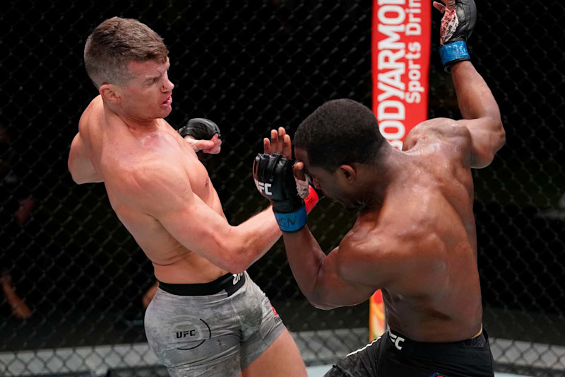 Thompson punches Geoff Neal in a welterweight fight in 2020.