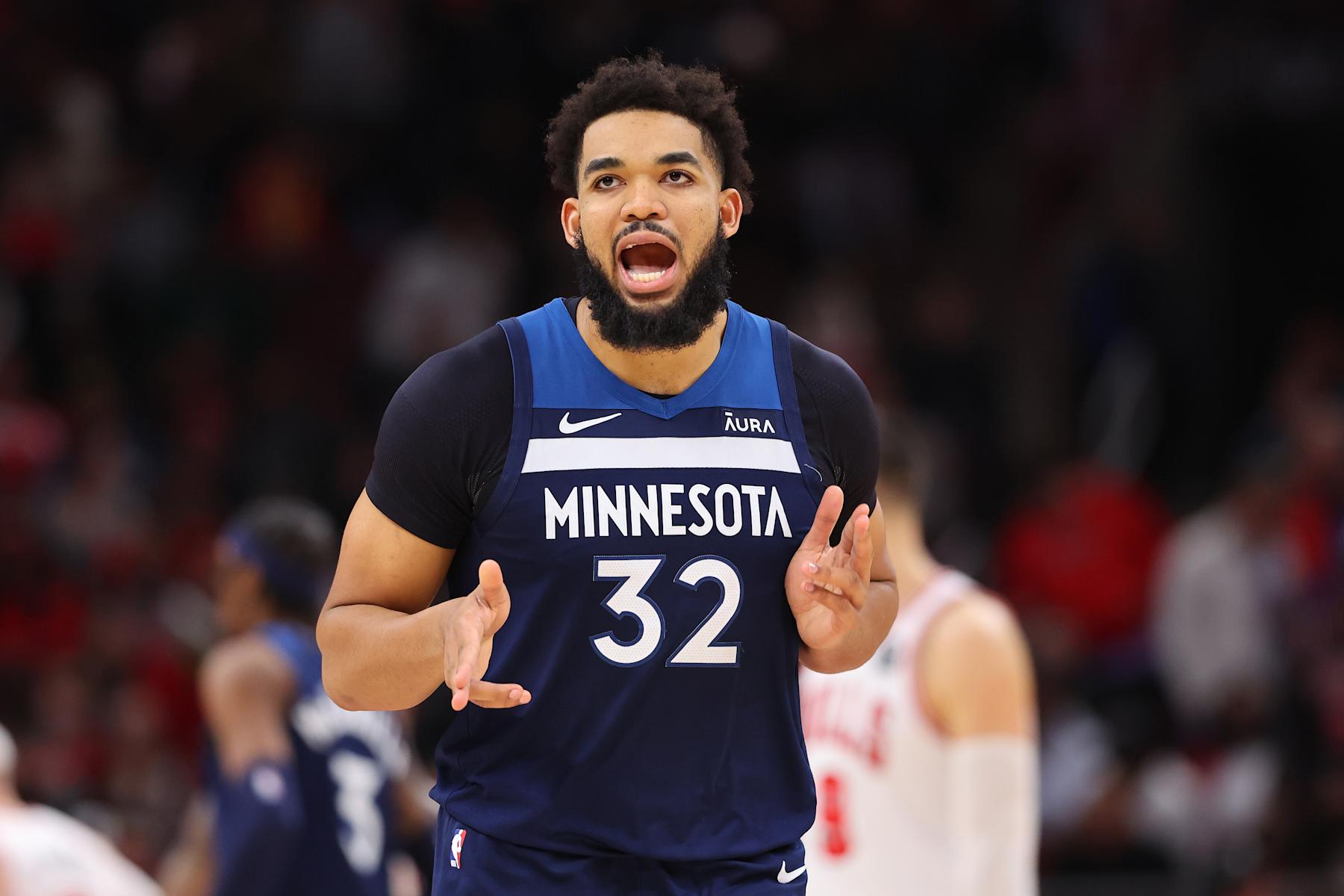 CHICAGO, ILLINOIS - FEBRUARY 06: Karl-Anthony Towns #32 of the Minnesota Timberwolves celebrates a three pointer against the Chicago Bulls during the second half at the United Center on February 06, 2024 in Chicago, Illinois. NOTE TO USER: User expressly acknowledges and agrees that, by downloading and or using this photograph, User is consenting to the terms and conditions of the Getty Images License Agreement.  (Photo by Michael Reaves/Getty Images)