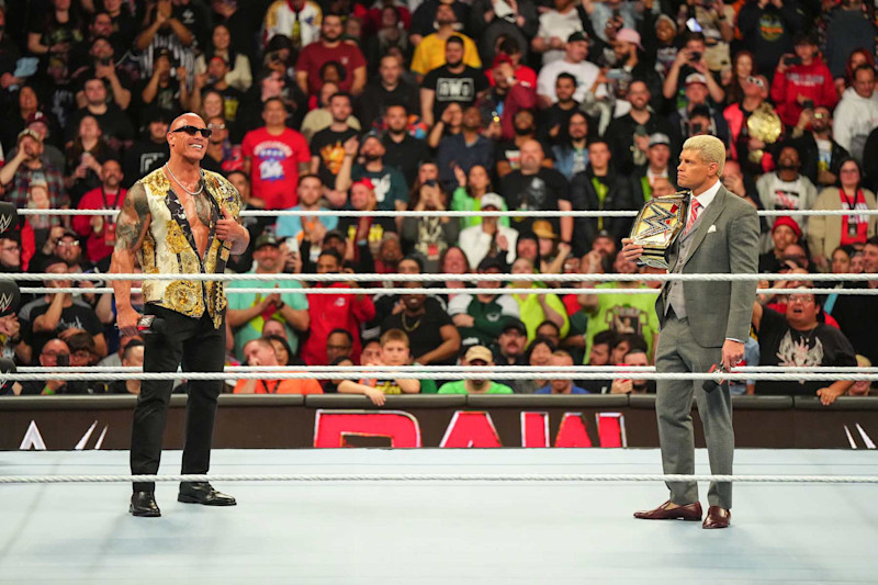 PHILADELPHIA, PENNSYLVANIA - APRIL 08: Dwayne "The Rock" Johnson stands in ring with Cody Rhodes at the Wells Fargo Center on April 8, 2024 in Philadelphia, Pennsylvania. (Photo by WWE/Getty Images)