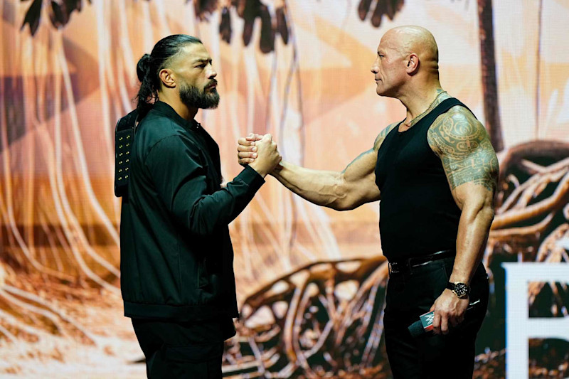 LAS VEGAS, NV - FEBRUARY 08:  Dwayne "The Rock" Johnson and Roman Reigns during the WWE Wrestlemania XL Kickoff on February 08, 2024, at T-Mobile Arena in Las Vegas, NV. (Photo by Louis Grasse/PXimages/Icon Sportswire via Getty Images)