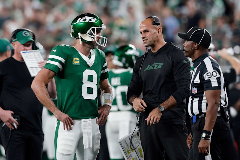 EAST RUTHERFORD, NEW JERSEY - SEPTEMBER 19: (NEW YORK DAILIES OUT)  Aaron Rodgers #8 and head coach Robert Saleh of the New York Jets in action against the New England Patriots at MetLife Stadium on September 19, 2024 in East Rutherford, New Jersey. The Jets defeated the Patriots 24-3. (Photo by Jim McIsaac/Getty Images)