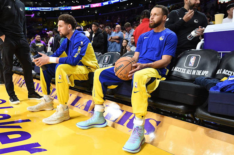 LOS ANGELES, CA - APRIL 9: Klay Thompson #11 and Stephen Curry #30 of the Golden State Warriors look on before the game against the Los Angeles Lakers on April 9, 2024 at Crypto.Com Arena in Los Angeles, California. NOTE TO USER: User expressly acknowledges and agrees that, by downloading and/or using this Photograph, user is consenting to the terms and conditions of the Getty Images License Agreement. Mandatory Copyright Notice: Copyright 2024 NBAE (Photo by Andrew D. Bernstein/NBAE via Getty Images)