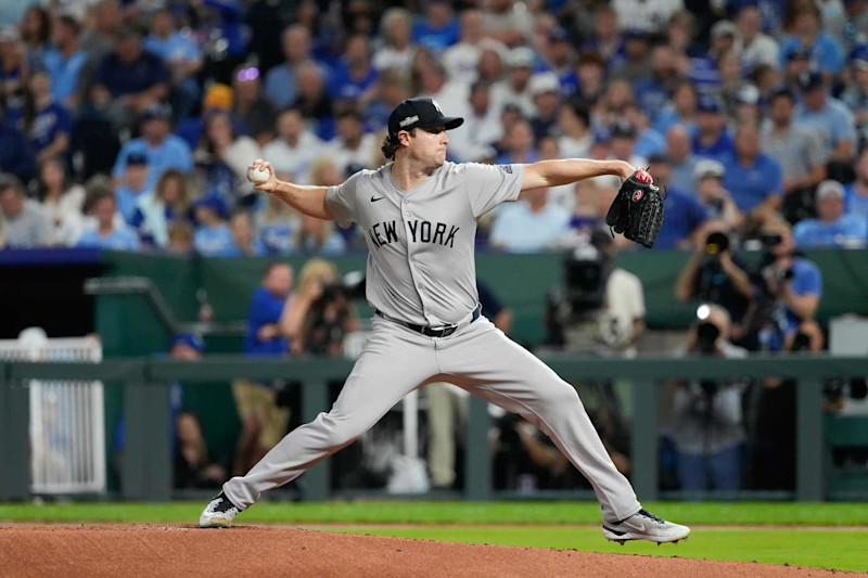 KANSAS CITY, MISSOURI - OCTOBER 10: Gerrit Cole #45 of the New York Yankees throws a pitch during the first inning during Game Four of the Division Series at Kauffman Stadium on October 10, 2024 in Kansas City, Missouri. (Photo by Ed Zurga/Getty Images)