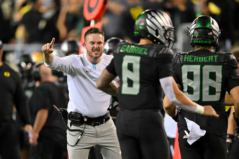 EUGENE, OREGON - OCTOBER 12: Head coach Dan Lanning of the Oregon Ducks reacts toward Dillon Gabriel #8 scoring a touchdown during the fourth quarter of the game against the Ohio State Buckeyes at Autzen Stadium on October 12, 2024 in Eugene, Oregon. (Photo by Alika Jenner/Getty Images)