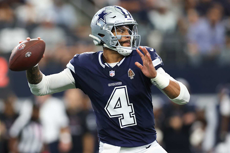 ARLINGTON, TEXAS - OCTOBER 13: Dak Prescott #4 of the Dallas Cowboys throws a pass in the first quarter of a gameagainst the Detroit Lions  at AT&T Stadium on October 13, 2024 in Arlington, Texas. (Photo by Ron Jenkins/Getty Images)