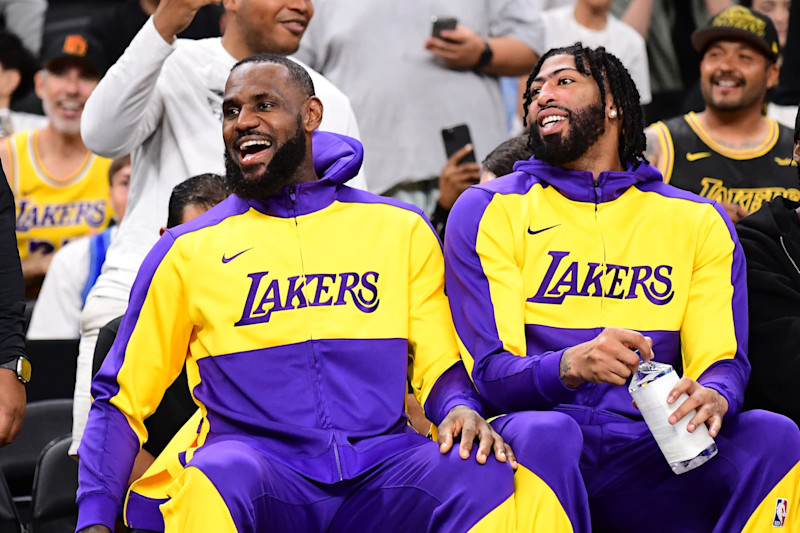 LOS ANGELES, CA - OCTOBER 6: LeBron James #23 and Anthony Davis #3 of the Los Angeles Lakers sits on the bench against the Phoenix Suns on October 6, 2024 at Acrisure Arena in Palm Springs, California. NOTE TO USER: User expressly acknowledges and agrees that, by downloading and/or using this Photograph, user is consenting to the terms and conditions of the Getty Images License Agreement. Mandatory Copyright Notice: Copyright 2024 NBAE (Photo by Adam Pantozzi/NBAE via Getty Images)