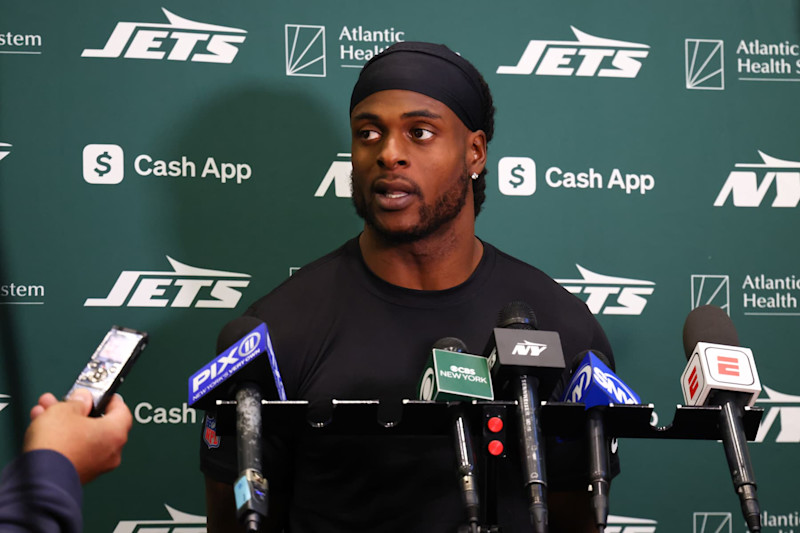 EAST RUTHERFORD, NEW JERSEY - OCTOBER 16: Davante Adams #17 of the New York Jets speaks to members of the media at the Atlantic Health Jets Training Center on October 16, 2024 in Florham Park, New Jersey. (Photo by Ed Mulholland/Getty Images)