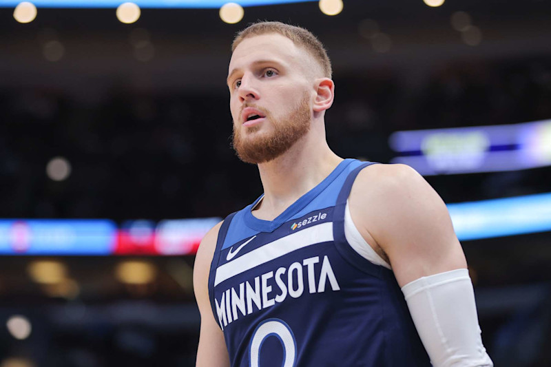 CHICAGO, IL - OCTOBER 16: Minnesota Timberwolves guard Donte DiVincenzo (0) looks on during the first half of a preseason game against the Chicago Bulls on October 16, 2024 at the United Center in Chicago, Illinois. (Photo by Melissa Tamez/Icon Sportswire via Getty Images)