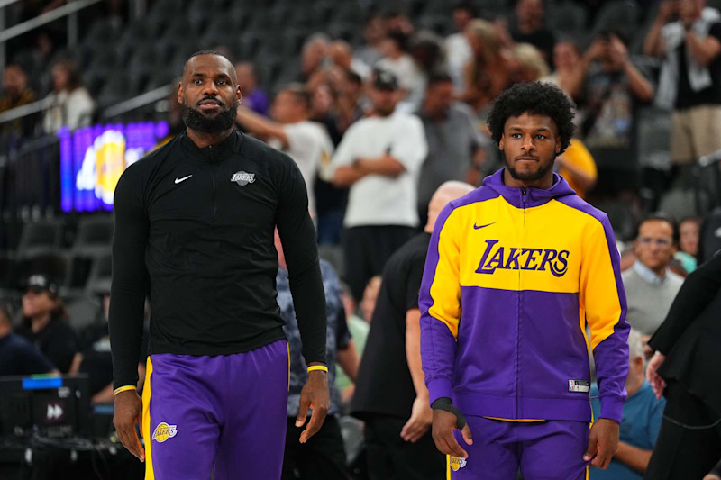 LAS VEGAS, NV - OCTOBER 15: LeBron James #23 and Bronny James #9 of the Los Angeles Lakers warms up before the game before the game against the Golden State Warriors during the 2024 NBA Preseason on October 15, 2024 at T-Mobile Arena in Las Vegas, Nevada. NOTE TO USER: User expressly acknowledges and agrees that, by downloading and or using this photograph, User is consenting to the terms and conditions of the Getty Images License Agreement. Mandatory Copyright Notice: Copyright 2024 NBAE  (Photo by Jeff Bottari/NBAE via Getty Images)