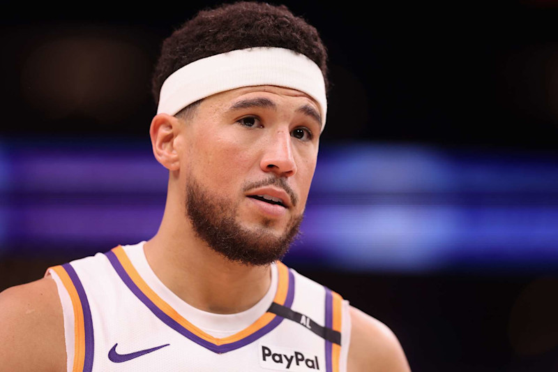 PHOENIX, ARIZONA - OCTOBER 17: Devin Booker #1 of the Phoenix Suns reacts during the second half of the preseason NBA game against the Los Angeles Lakers at Footprint Center on October 17, 2024 in Phoenix, Arizona. NOTE TO USER: User expressly acknowledges and agrees that, by downloading and/or using this photograph, user is consenting to the terms and conditions of the Getty Images License Agreement.  (Photo by Christian Petersen/Getty Images)