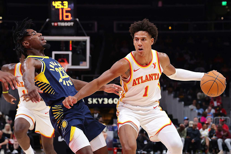 ATLANTA, GEORGIA - OCTOBER 08: Jalen Johnson #1 of the Atlanta Hawks is charged with an offensive foul as he drives into Aaron Nesmith #23 of the Indiana Pacers during the second quarter at State Farm Arena on October 08, 2024 in Atlanta, Georgia. NOTE TO USER: User expressly acknowledges and agrees that, by downloading and/or using this photograph, user is consenting to the terms and conditions of the Getty Images License Agreement. (Photo by Kevin C. Cox/Getty Images)