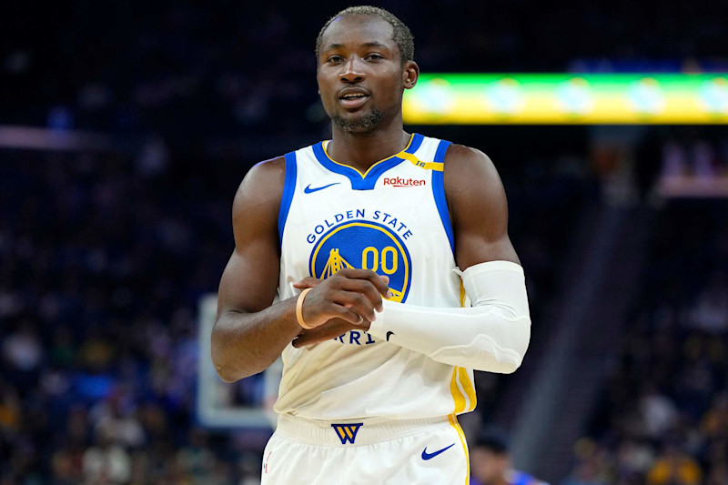 SAN FRANCISCO, CALIFORNIA - OCTOBER 13: Jonathan Kuminga #00 of the Golden State Warriors looks on against the Detroit Pistons during the first half of an NBA preseason game at Chase Center on October 13, 2024 in San Francisco, California. NOTE TO USER: User expressly acknowledges and agrees that, by downloading and or using this photograph, User is consenting to the terms and conditions of the Getty Images License Agreement. (Photo by Thearon W. Henderson/Getty Images)