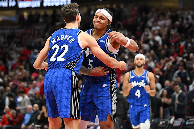 CHICAGO, ILLINOIS - NOVEMBER 15: Paolo Banchero #5 of the Orlando Magic celebrates with Franz Wagner #22 after making a basket to defeat the Chicago Bulls 96-94 at United Center on November 15, 2023 in Chicago, Illinois. NOTE TO USER: User expressly acknowledges and agrees that, by downloading and or using this photograph, User is consenting to the terms and conditions of the Getty Images License Agreement. (Photo by Jamie Sabau/Getty Images)