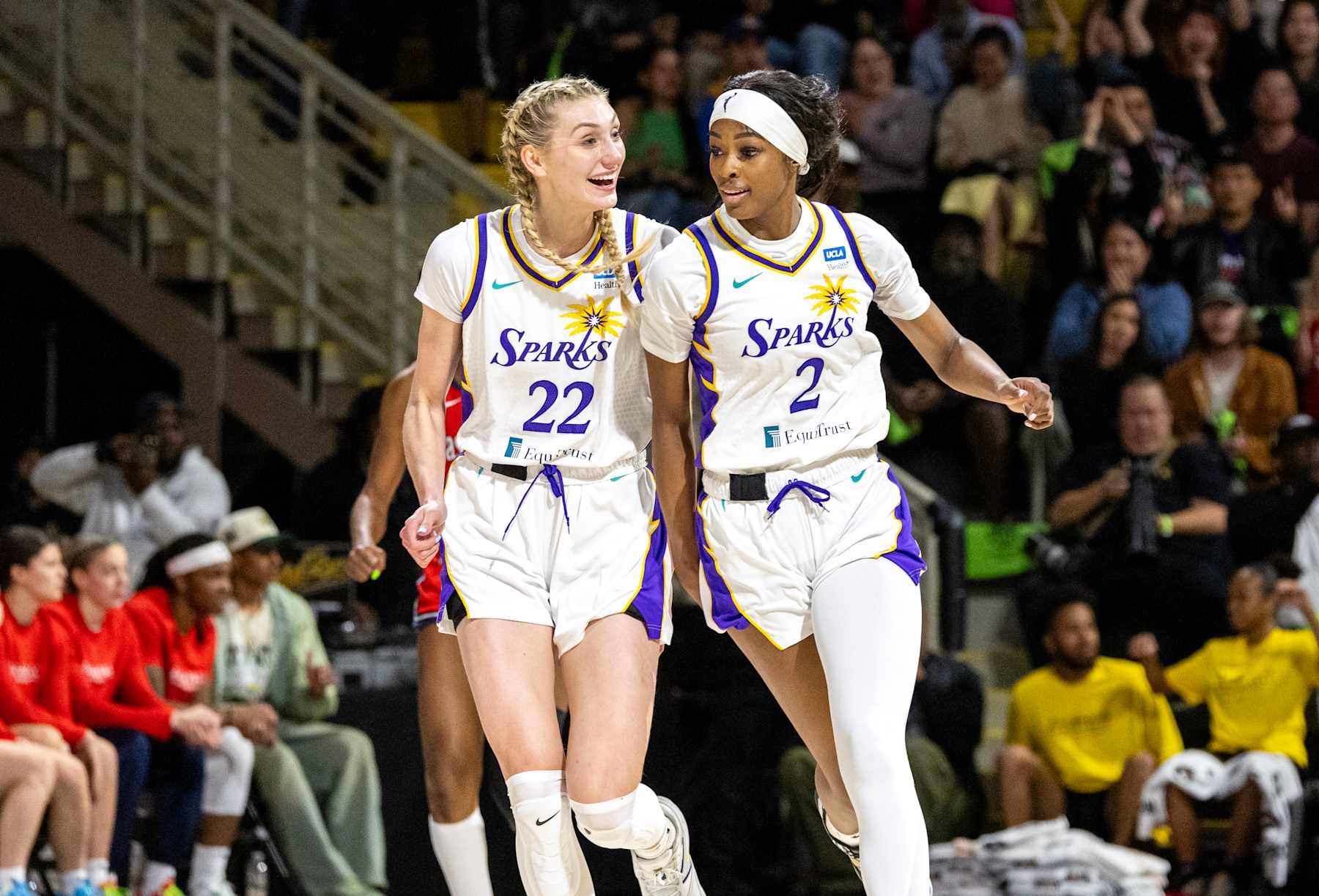 LONG BEACH, CA - MAY 21, 2024: Los Angeles Sparks forward Cameron Brink (22) and Los Angeles Sparks forward Rickea Jackson (2) react as they take the lead over the Washington Mystics at Walter Pyramid at Long Beach State on May 21, 2024 in Long Beach, California. (Gina Ferazzi / Los Angeles Times via Getty Images)