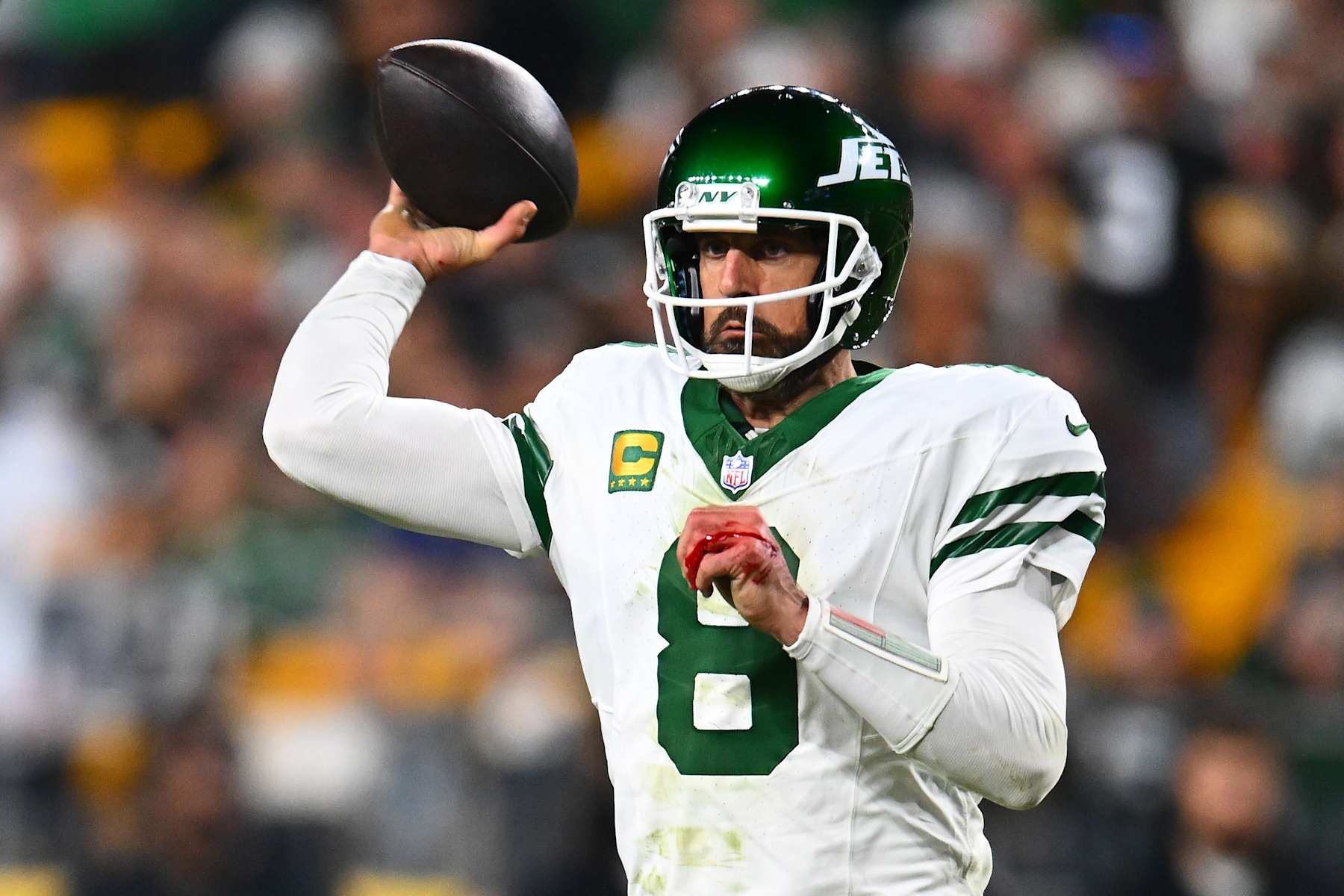 PITTSBURGH, PENNSYLVANIA - OCTOBER 20: Aaron Rodgers #8 of the New York Jets throws a pass with an apparent injury to his hand during the third quarter against the Pittsburgh Steelers at Acrisure Stadium on October 20, 2024 in Pittsburgh, Pennsylvania. (Photo by Joe Sargent/Getty Images)
