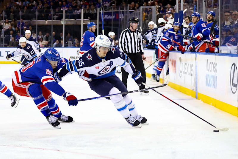 NEW YORK, NY - MARCH 19: Winnipeg Jets Center Mark Scheifele (55) skates against New York Rangers Left Wing Will Cuylle (50) during the first period of the National Hockey League game between the Winnipeg Jets and the New York Rangers on March 19, 2024 at Madison Square Garden in New York, NY. (Photo by Joshua Sarner/Icon Sportswire via Getty Images)