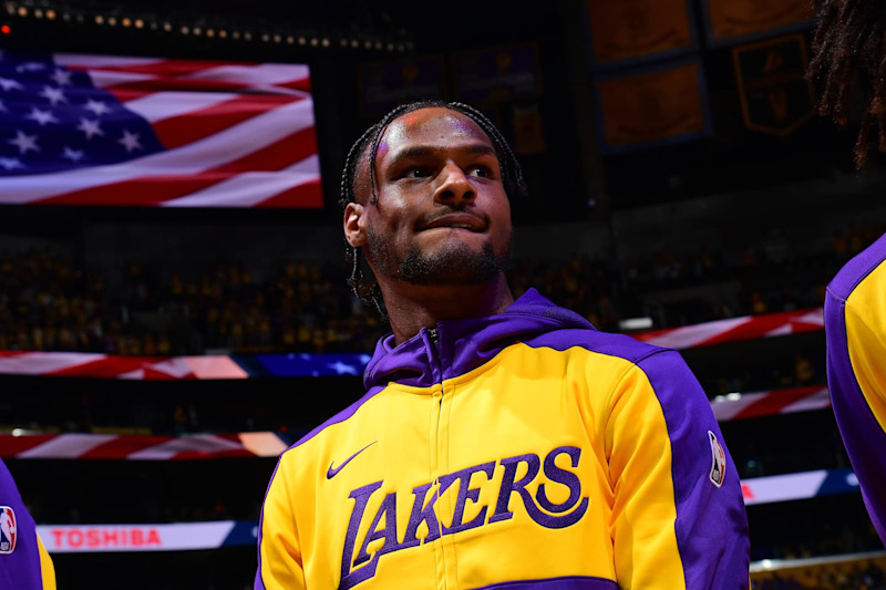 LOS ANGELES, CA - OCTOBER 22: Bronny James #9 of the Los Angeles Lakers stands for the National Anthem before the game against the Minnesota Timberwolves on October 22, 2024 at Crypto.Com Arena in Los Angeles, California. NOTE TO USER: User expressly acknowledges and agrees that, by downloading and/or using this Photograph, user is consenting to the terms and conditions of the Getty Images License Agreement. Mandatory Copyright Notice: Copyright 2024 NBAE (Photo by Adam Pantozzi/NBAE via Getty Images)